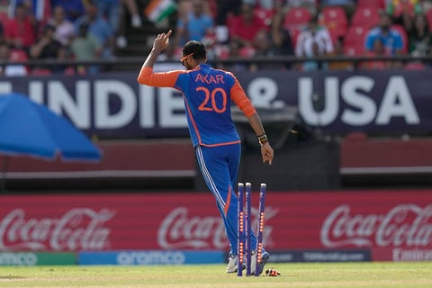 Axar Patel celebrates the dismissal of Liam Livingstone 